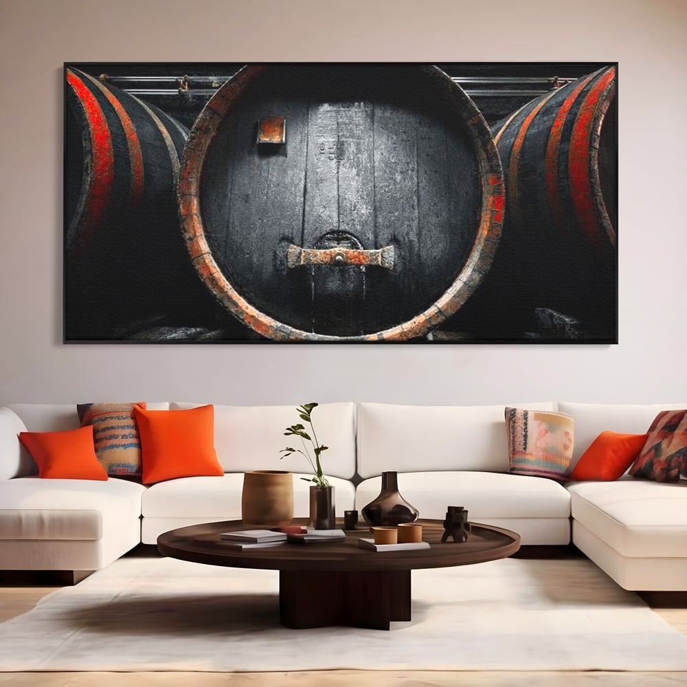 Tablou canvas cu butoaie de lemn din crama, in rama de aluminiu negru, pe perete intr-un living